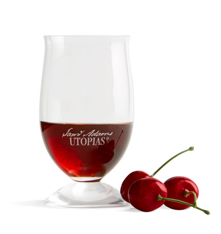 Glass of 2021 Utopias with cherries