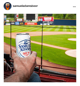 Can of Sam 76 at baseball field